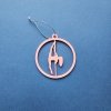 Pink Glow in the Dark Pole Dance Ornament (Pose D) on a blue background. Handmade Christmas Decoration